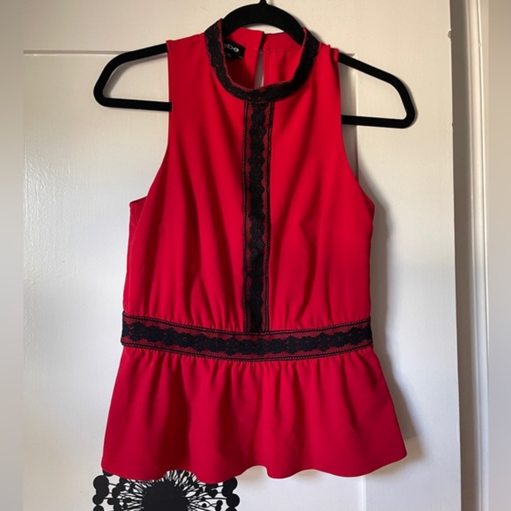 Bebe red with black lace detail peplum top size s